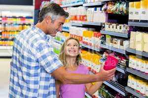 Father and daughter in the supermarket