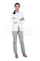 Serious businesswoman with crossed arms