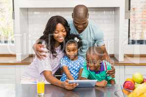 Happy family using tablet