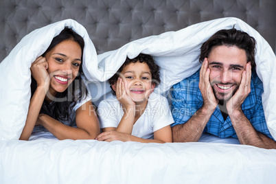 Happy family posing for camera