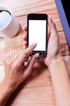 Businesswoman holding smartphone