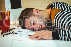 Man asleep at his desk