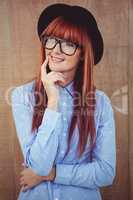 Smiling hipster woman posing face to the camera