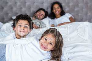 Family in bed