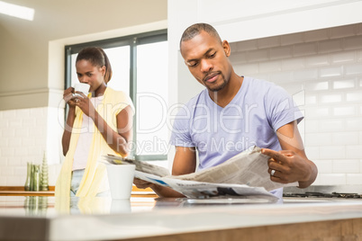 Casual happy couple having breakfast