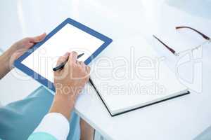 Businesswoman using her tablet pc