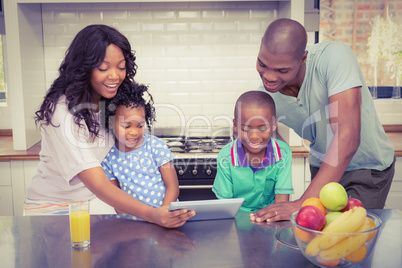 Happy family using tablet