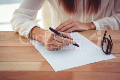 Cropped image of woman drawing