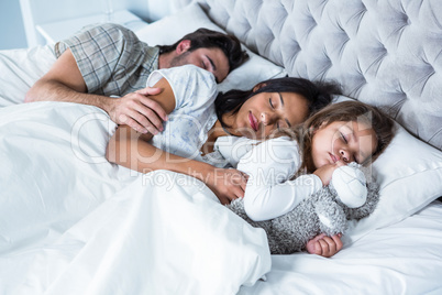 Family sleeping together