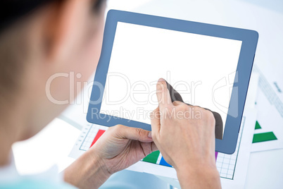 Businesswoman using her tablet pc