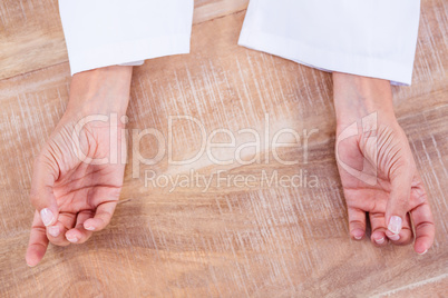 Close up view of hands in yoga pose