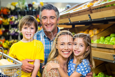 Smiling happy family posing together