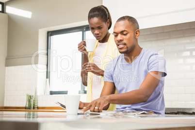 Casual happy couple having breakfast