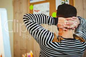 Man relaxing at his desk