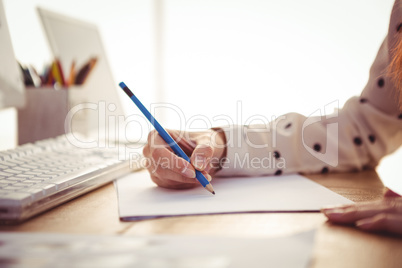 Cropped image of woman drawing