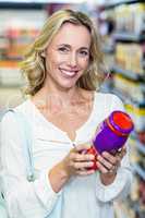 Woman reading nutritional values