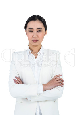 Serious businesswoman with crossed arms