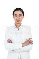 Serious businesswoman with crossed arms