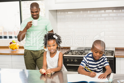 Father and children in the kitchen