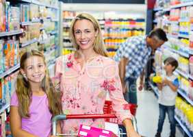 Happy family at the supermarket