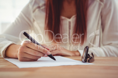 Cropped image of woman drawing