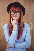 Smiling hipster woman posing face to the camera