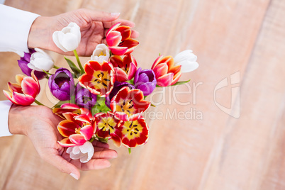 Woman holding a bouquet of flower