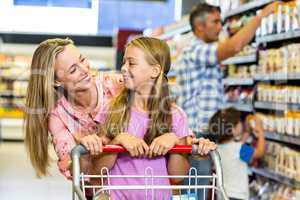 Smiling mother and daughter