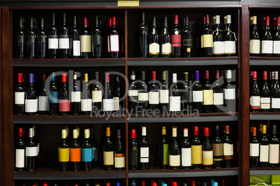 View of row bottles of wine