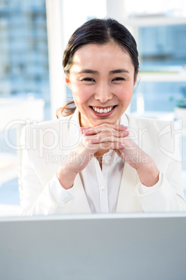Smiling businesswoman looking at the camera