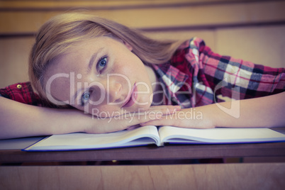 Blonde student smiling at the camera