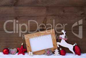 Red Christmas Card With Decoration On Snow, Copy Space