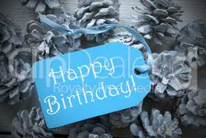 Light Blue Label On Fir Cones With Happy Birthday