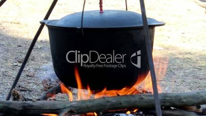 cauldron on campfire