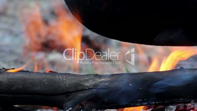 cauldron on campfire