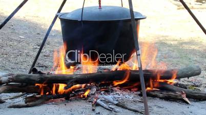 cauldron on campfire