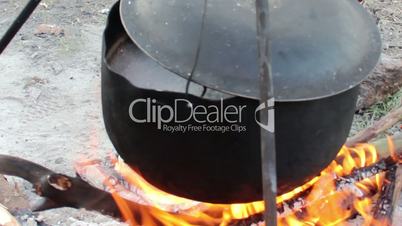 cauldron on campfire