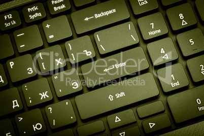 Electronic collection - laptop keyboard. The focus on the Enter