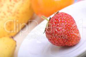 strawberry, mandarin, orange, banana, many different fruits for the health of the entire family