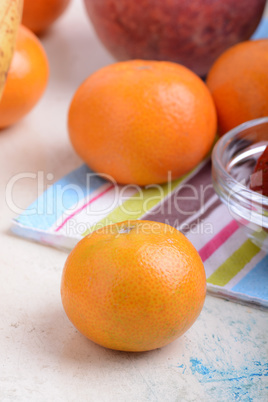 Fresh organic fruits ( strawberry, banana, mandarin, orange)