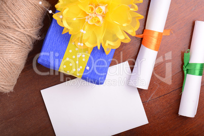 color gift boxes on wooden background