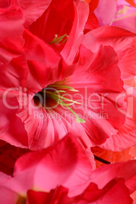 artificial flowers red handmade velor tissue background close up