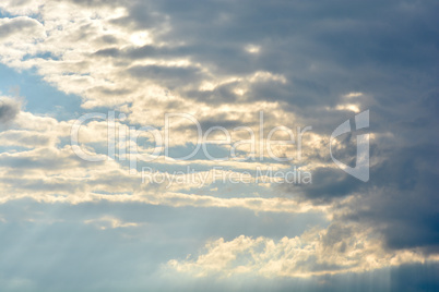 Overcast day sun beam through the clouds