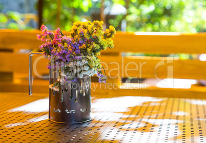 Bouquet of dried flowers in a cup