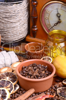 coffee beans, candle, old bottle, vintage clock, lemon, cinnamon, anise and aroma spice