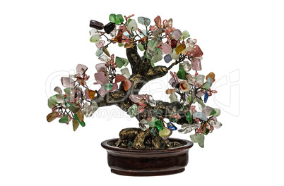Decorative tree from natural semiprecious stones isolated on whi