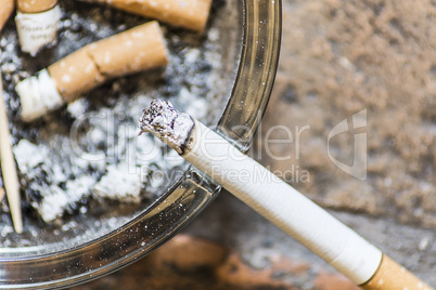 Cigarettes on ashtray