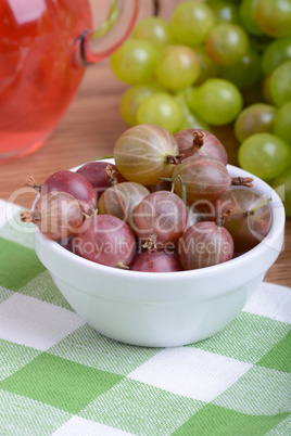 gooseberry and grapes health food concept