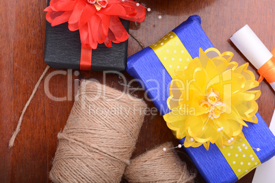 color gift boxes on wooden background