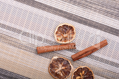 Slices of fresh dried lemon, orange and spices for cooking or baking